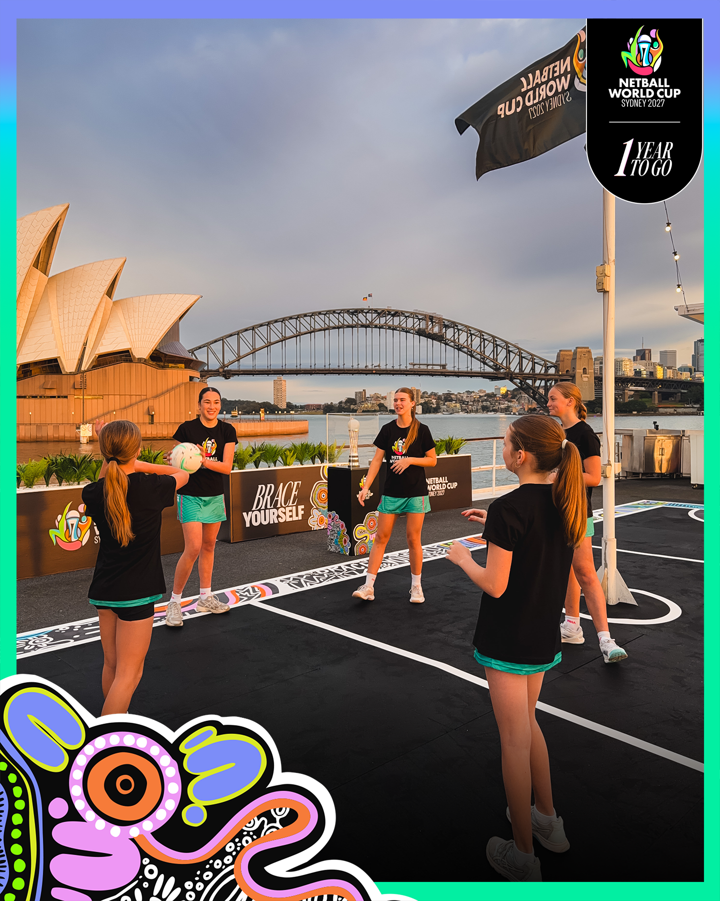 Junior netballers playing on the floating netball court at Sydney Harbour. 